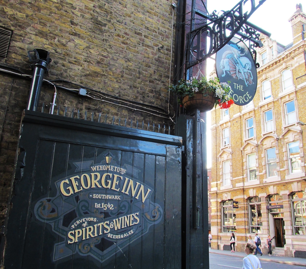 the george inn street sign and entrance gate