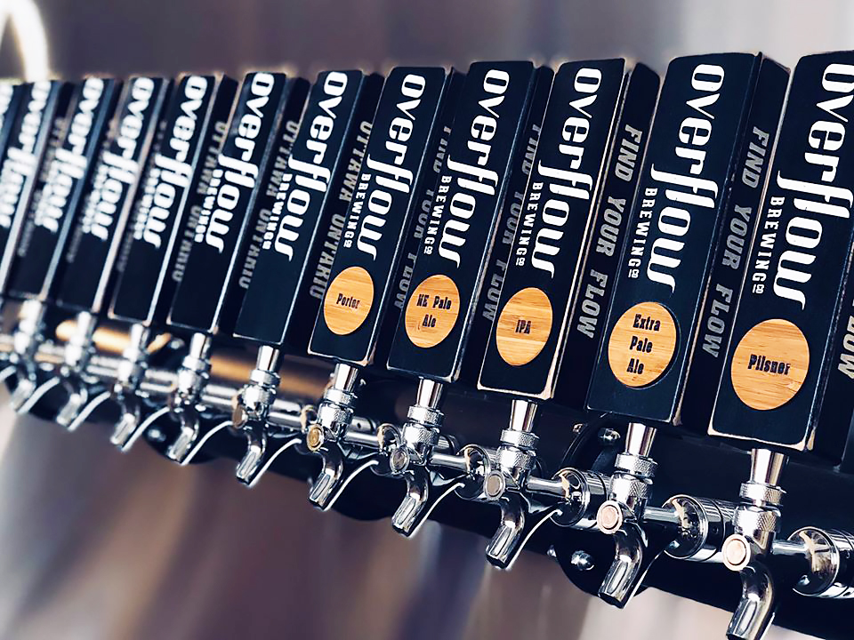 overflow brewing co. tap handles
