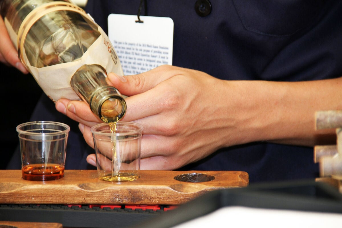 whiskey being poured for tasting